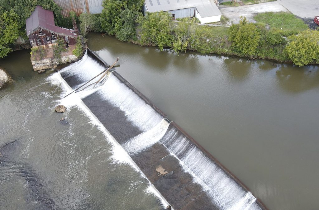 dam overflowing scaled e1743020167643
